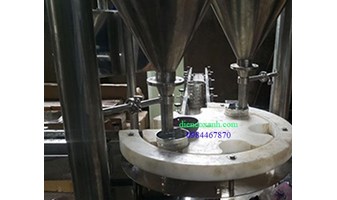 Máy định lượng bột và đóng lon bột