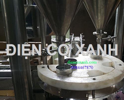 Dây chuyền chiết rót lon sữa bột dạng mâm xoay bán tự động