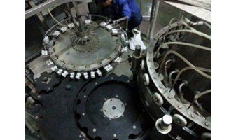 DÂY CHUYỀN KIỂU CHIẾT RÓT MÂM XOAY